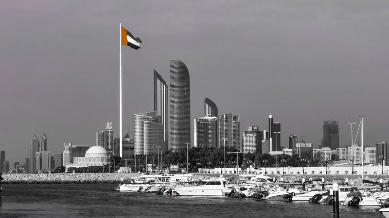 Abu Dhabi skyline with the UAE flag