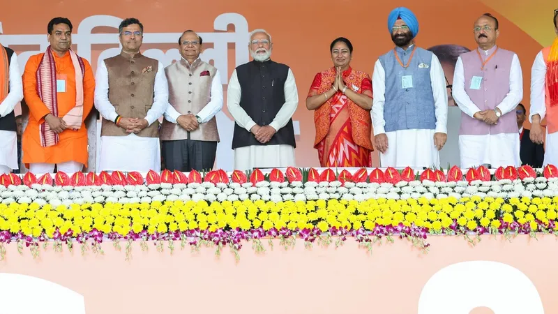 Rekha Gupta on stage with Prime Minister Narendra Modi, Lieutenant Governor V.K. Saxena and the new ministers