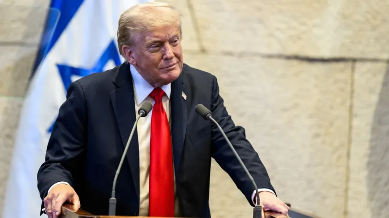 Donald Trump speaking at a podium in Israel's Knesset